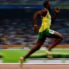 A sprinter racing on a track