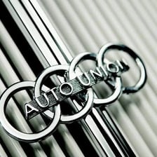 An Audi vehicle displaying its four-ring emblem.
