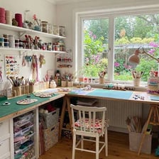 A colorful workspace with handmade arts-and-crafts projects