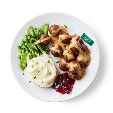 A plate of Swedish meatballs served in an IKEA cafeteria.