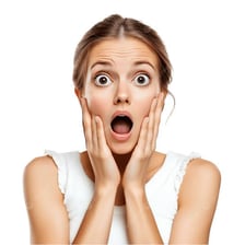 A surprised person reacting with an open-mouthed gasp