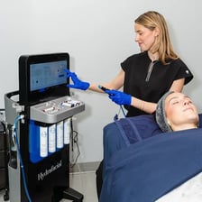 A skincare treatment being performed at a spa