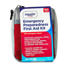 An open first-aid kit containing bandages and medical supplies.