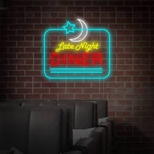 A neon sign using the informal spelling “nite”
