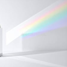 A glass prism separating a beam of light into a rainbow spectrum.