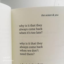 An open book displaying lines of poetry