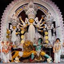 A decorated Durga idol at a Durga Puja celebration.
