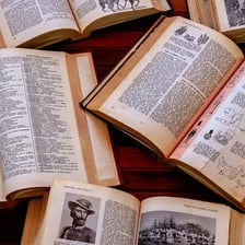An open history book on a table.