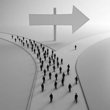 A person deciding between two paths at a crossroads.