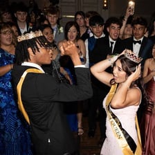 High school students dressed formally at a prom