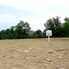 An undeveloped parcel of land prepared for construction.