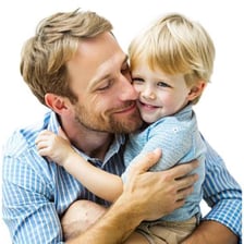 An adult looking affectionately at a child.