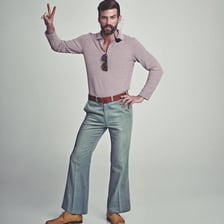 A person posing for a photograph.