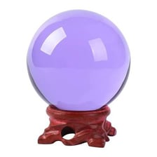A fortune teller looking at a crystal ball.