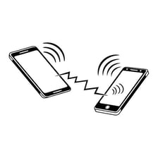 Two electronic devices connected while synchronizing data.