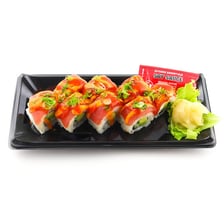 A sushi roll filled with spicy tuna