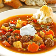 A bowl of thick goulash-style stew.