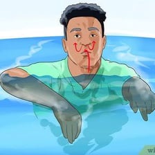 A swimmer using the doggy-paddle stroke.