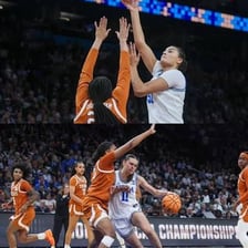 A basketball game representing a semifinal in a Final Four tournament.