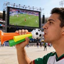 Fans sounding handheld air horns in a sports stadium