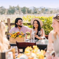 People sampling wine at a winery