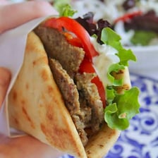 A Greek gyro sandwich served with tzatziki sauce.