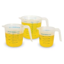 Several measured quantities shown in measuring cups