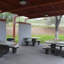 A roadside rest area beside a highway.