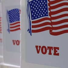 A voter marking a ballot in an election