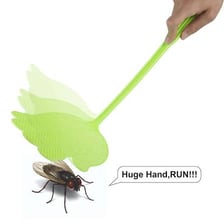 A hand swatting at a flying insect