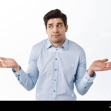 A person shrugging in apparent uncertainty.