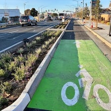An urban street with a clearly marked bicycle lane