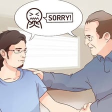 One person visibly ignoring another person in a social setting.