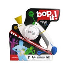 A Bop It handheld electronic game with its colored controls