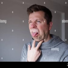 A person making a visibly dismissive expression