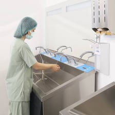 Surgical staff preparing for an operation in a hospital.