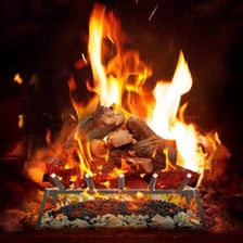 A glowing ember among fireplace logs.