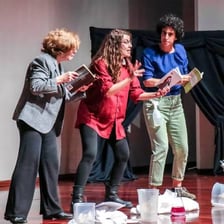 An actor giving an exaggerated theatrical performance