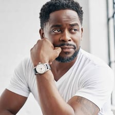 Dulé Hill as Gus Guster in the television series Psych.