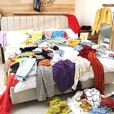 A cluttered room filled with objects that occupy its available space
