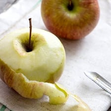 An apple with its outer peel removed