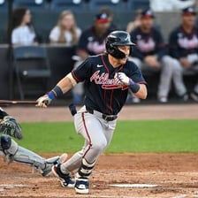 A baseball player from the Atlanta Braves standing at bat.
