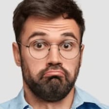 A person shrugging in response to a question about what else is new.