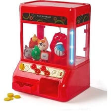 A plush toy sits among prizes inside an arcade claw machine.
