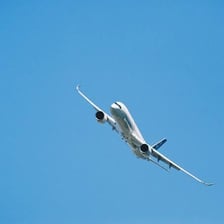 A passenger airplane flying through the sky