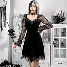 Person wearing a black Goth fashion outfit