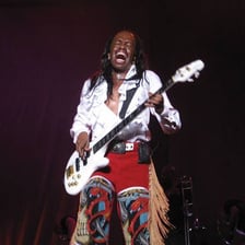 A bass singer performing with a microphone.