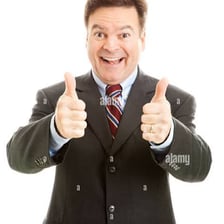A person enthusiastically agreeing to participate with a thumbs-up gesture
