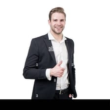 A person signaling approval with a thumbs-up gesture.