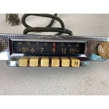 Car radio showing saved preset station buttons